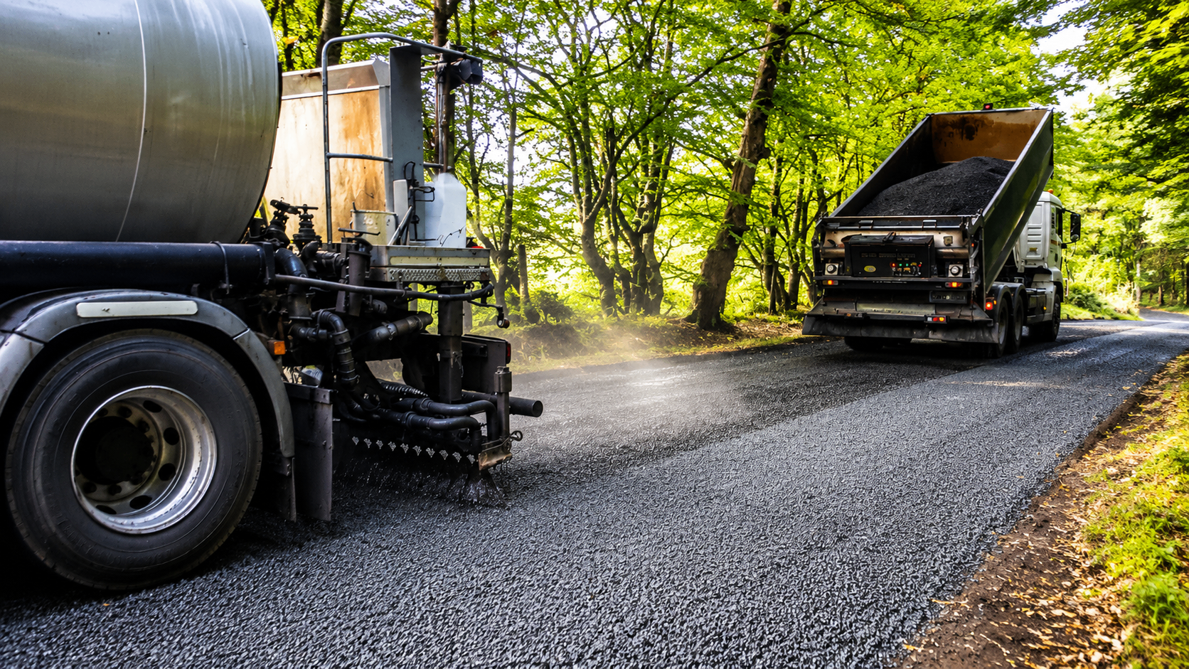 Roadteam surface dressing equipment carrying out road finishing works