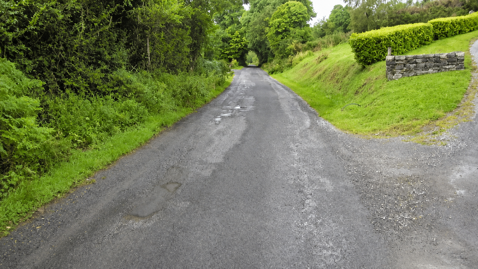 Manorhamilton road before Roadteam recycling works showing worn road surface